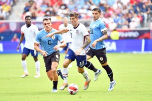 Christian Pulisic #10 of United States with the ball during a game between Uruguay and USMN