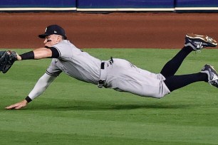 run-saving diving catch in the first inning of the Yankees' 4-2 loss to the Astros in Game 1 of the ALCS.