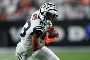 Tyler Boyd #83 of the Cincinnati Bengals runs with the ball in the fourth quarter against the Miami Dolphins at Paycor Stadium on September 29, 2022 in Cincinnati, Ohio.