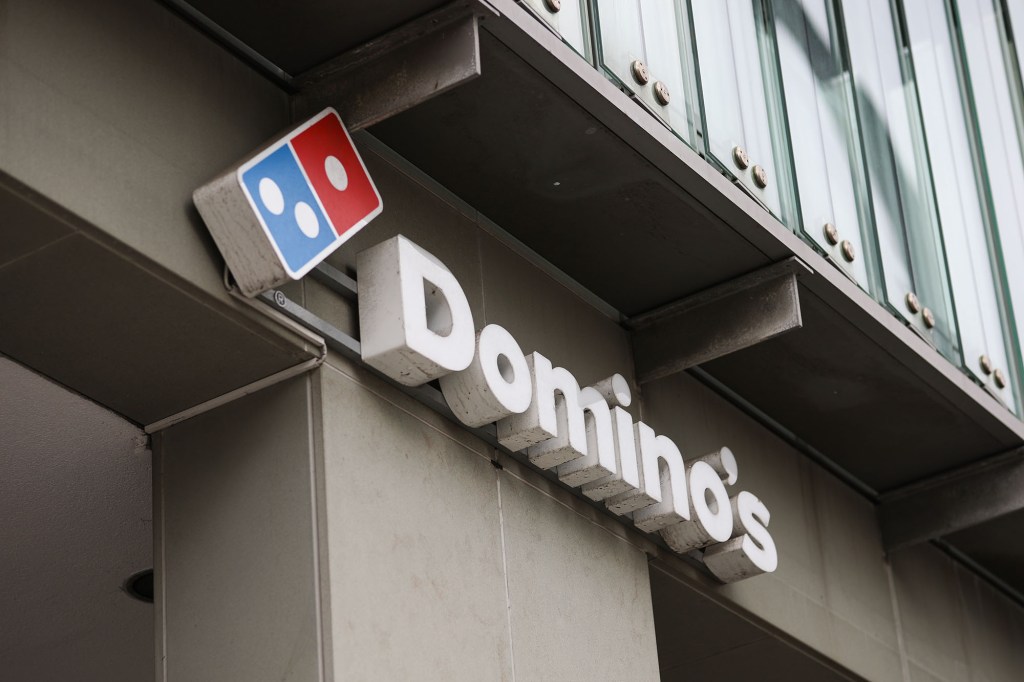A Dominos Pizza sign store is seen on July 03, 2020 in Hamburg, Germany. 