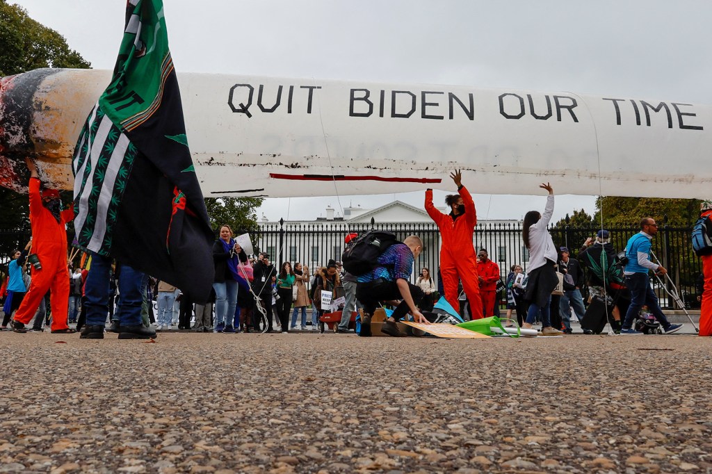 Marijuana activists protested at the White House after President Biden's pardon of federal marijuana convictions still left thousands in prison.