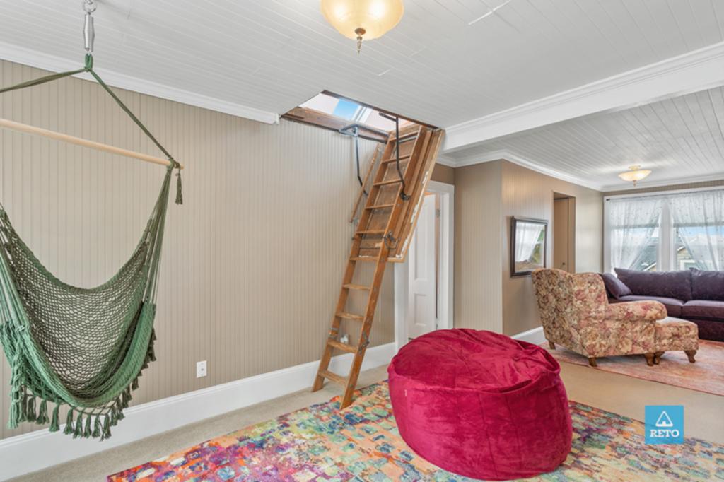 A ladder in the back leads up to the attic.