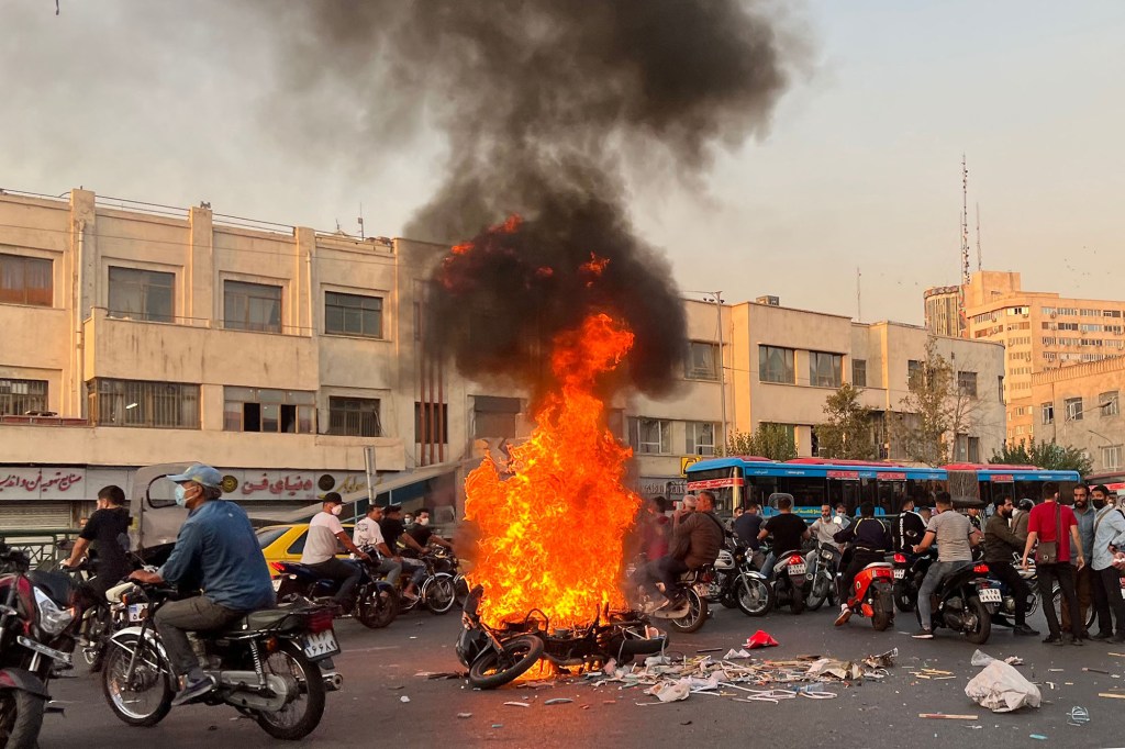 Demonstrators in support of Amini rally in Tehran on Oct. 8