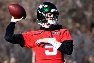 Mike White works out during Jets' practice.