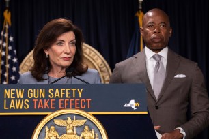 New York Gov. Kathy Hochul, left, and New York City Mayor Eric Adams