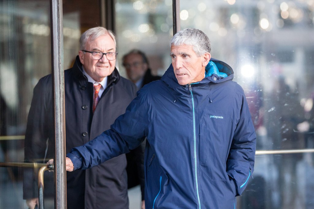 Rick Singer in casual clothes exiting a courthouse