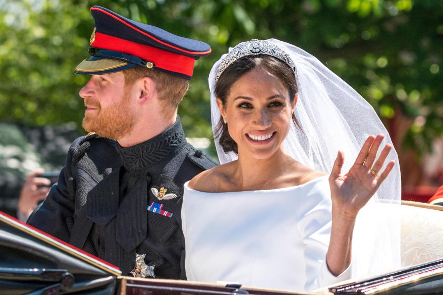 The Duke and Duchess of Sussex partake in their first joint carriage ride around Windsor immediately after their royal wedding.