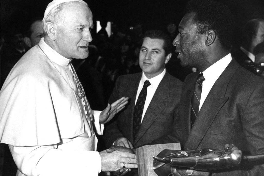 Pope Francis' stance stands in sharp contrast with his predecessors, including Pope John Paul II (seen here with soccer legend Pele in 1978), who authorized limited use of Latin Mass in 1984.