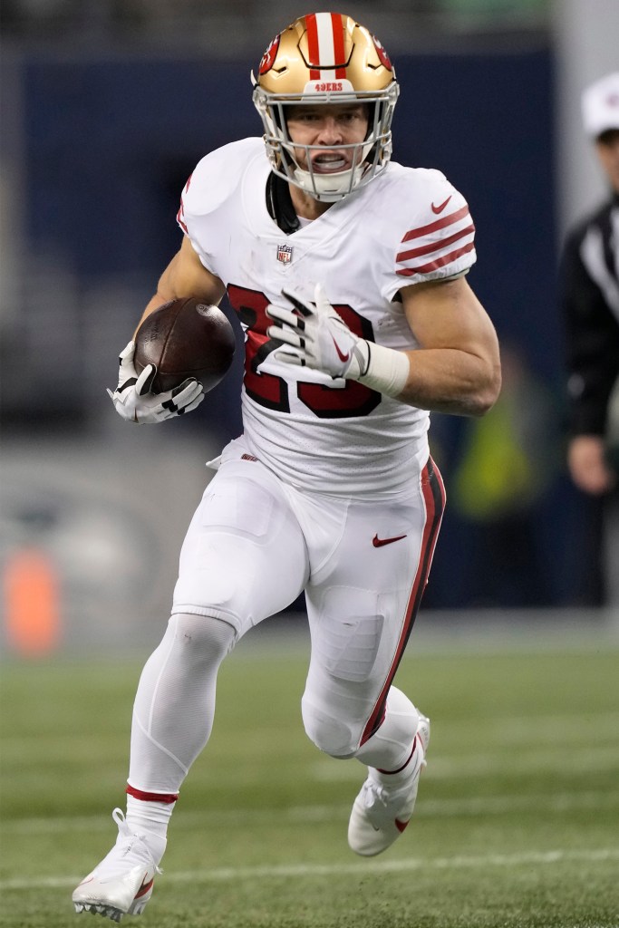 49ers running back Christian McCaffrey runs against the Seahawks on Dec. 15, 2022.