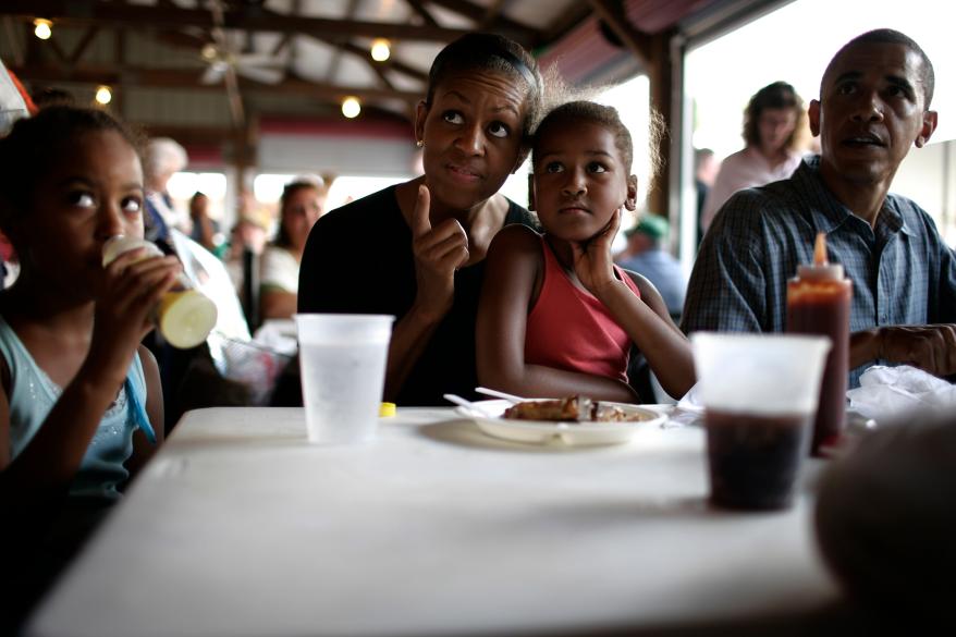 Michelle Obama and her daughters.