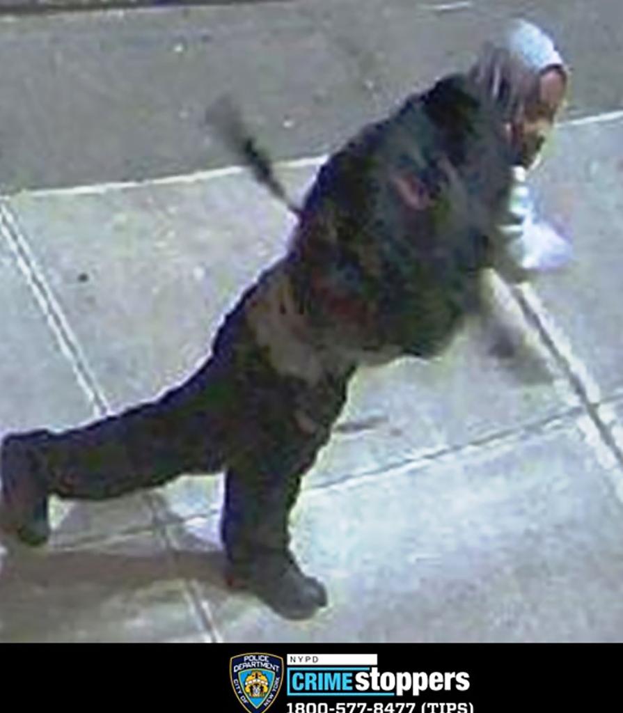 Police were looking for this man suspected of hurling two rocks at a Jewish middle school in Manhattan on Nov. 9.