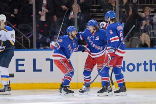 New York Rangers center Vincent Trocheck #16 celebrates a goal with his teammates during the second period.