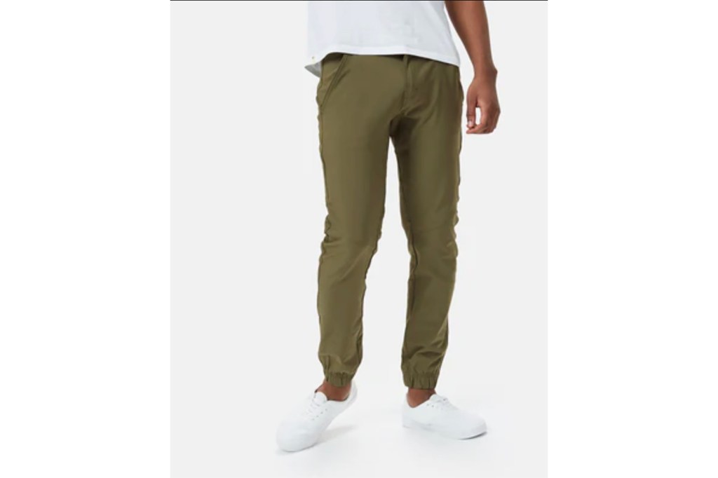 A man in olive joggers