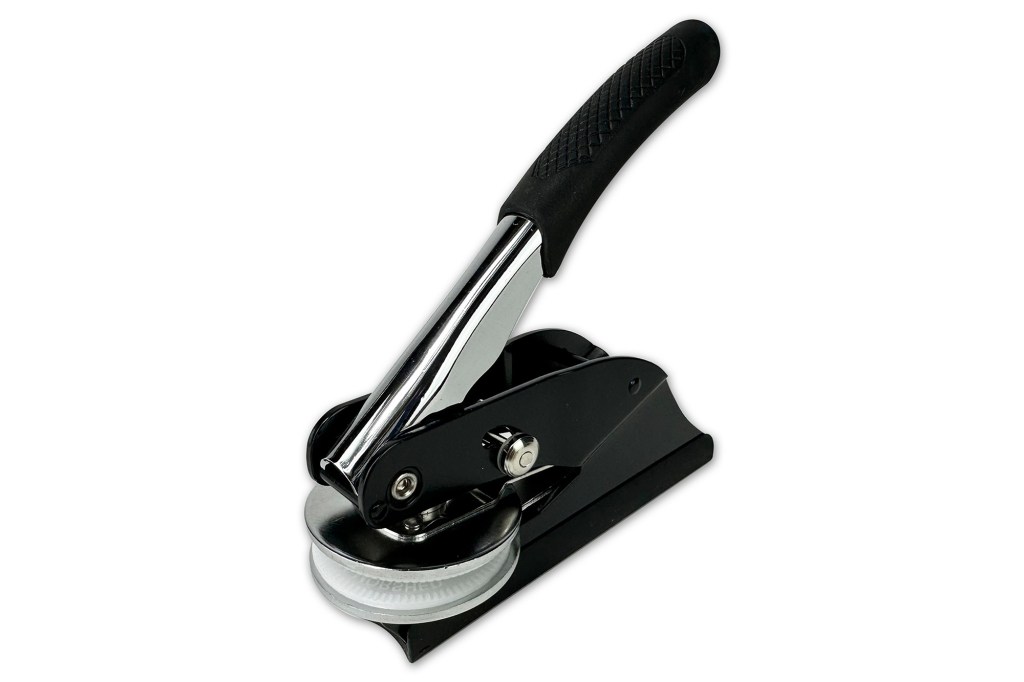 Black and silver stamp embosser