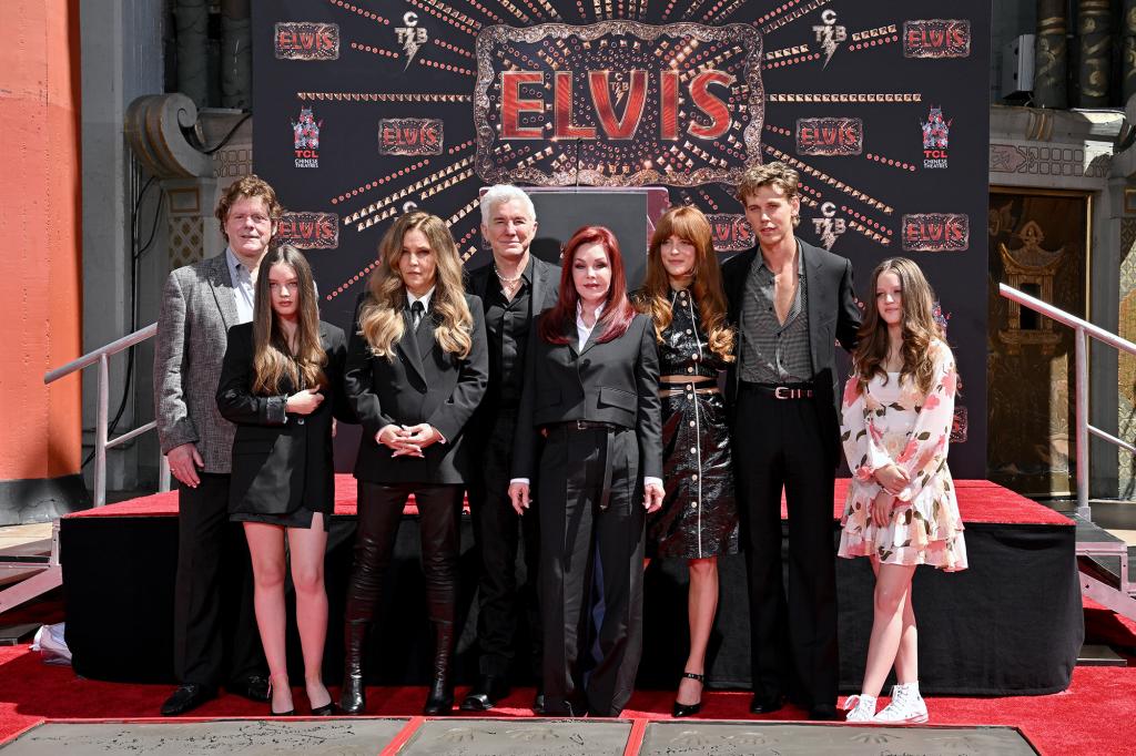 Steve Binder, Harper Vivienne Ann Lockwood, Lisa Marie Presley, Baz Luhrmann, Priscilla Presley, Riley Keough, Austin Butler, and Finley Aaron Love Lockwood attend the Handprint Ceremony honoring Three Generations of Presley's at TCL Chinese Theatre on June 21, 2022 in Hollywood, California.