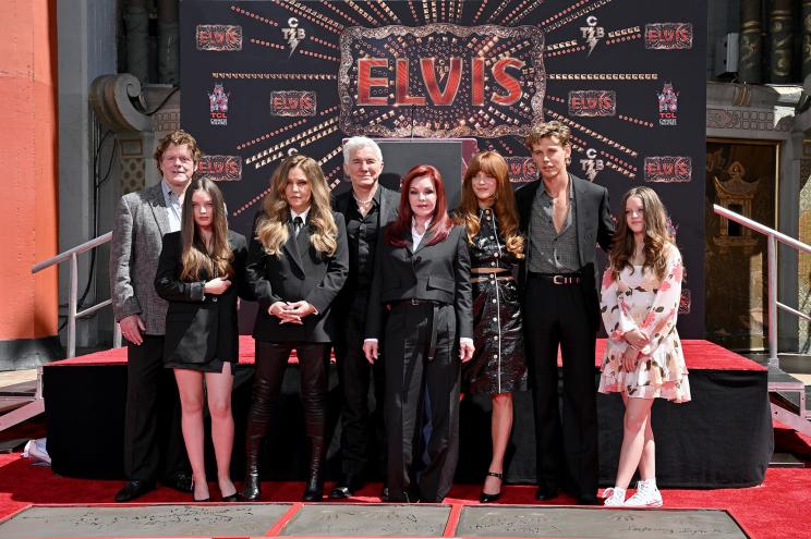 Steve Binder, Harper Vivienne Ann Lockwood, Lisa Marie Presley, Baz Luhrmann, Priscilla Presley, Riley Keough, Austin Butler, and Finley Aaron Love Lockwood attend the Handprint Ceremony honoring Three Generations of Presley's at TCL Chinese Theatre on June 21, 2022 in Hollywood, California.