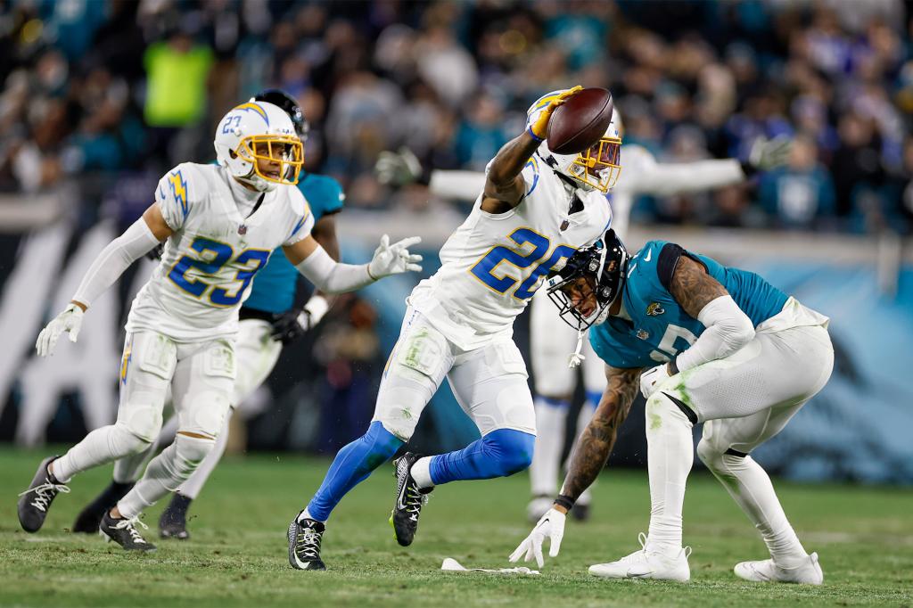 Asante Samuel Jr. celebrates one of his three interceptions in the first half for the Chargers.