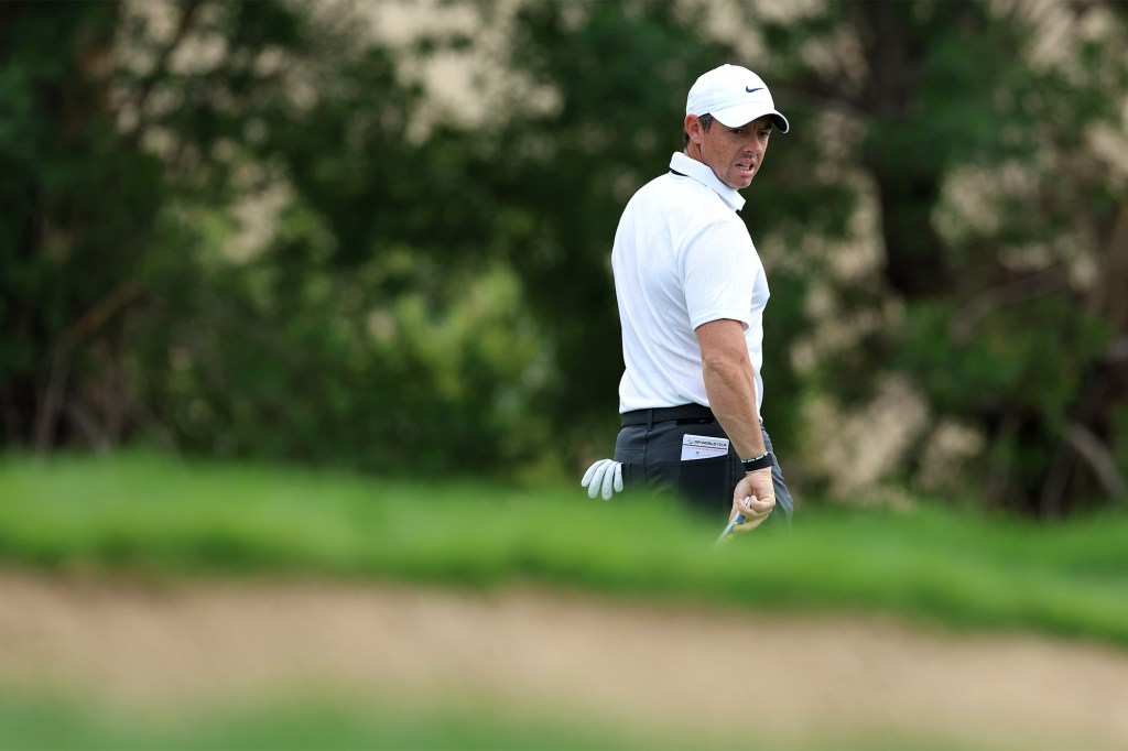 Rory McIlroy looks from his spot on the course during the Dubai Desert Classic's opening round.