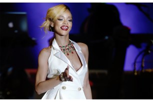 Singer Rihanna performs onstage.