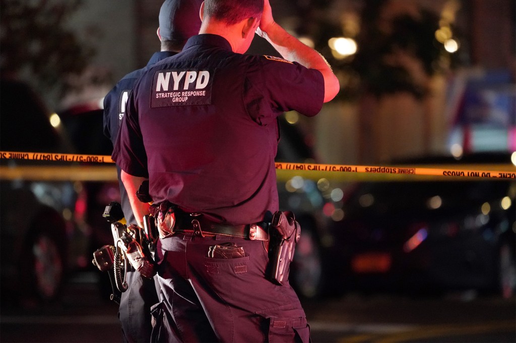 Police at the scene where two person was shot on Fordham Road near Valentine Avenue in the Bronx, NY around 12:30 a.m. on July 16, 2020. 