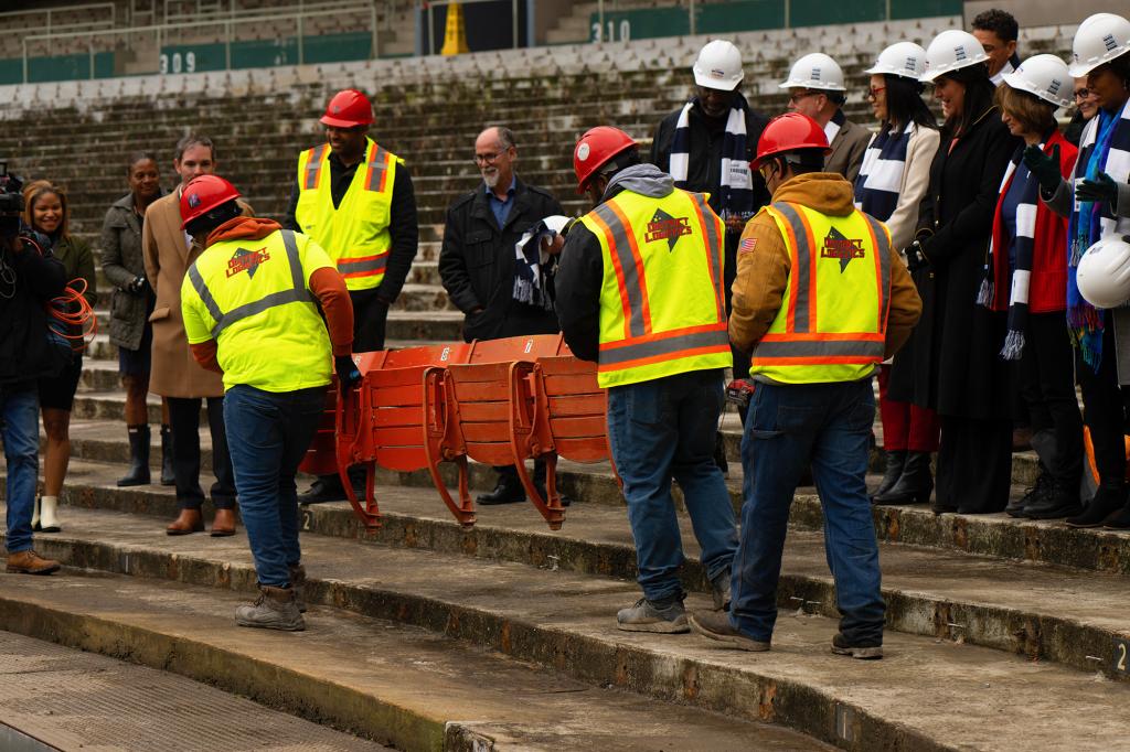 To further increase wages of blue-collar employees such as these Washington, DC construction workers, the government needs to reduce competition from undocumented immigrants.