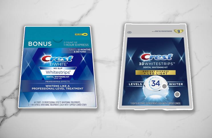 Two boxes of Crest White Strips on a white marble background.