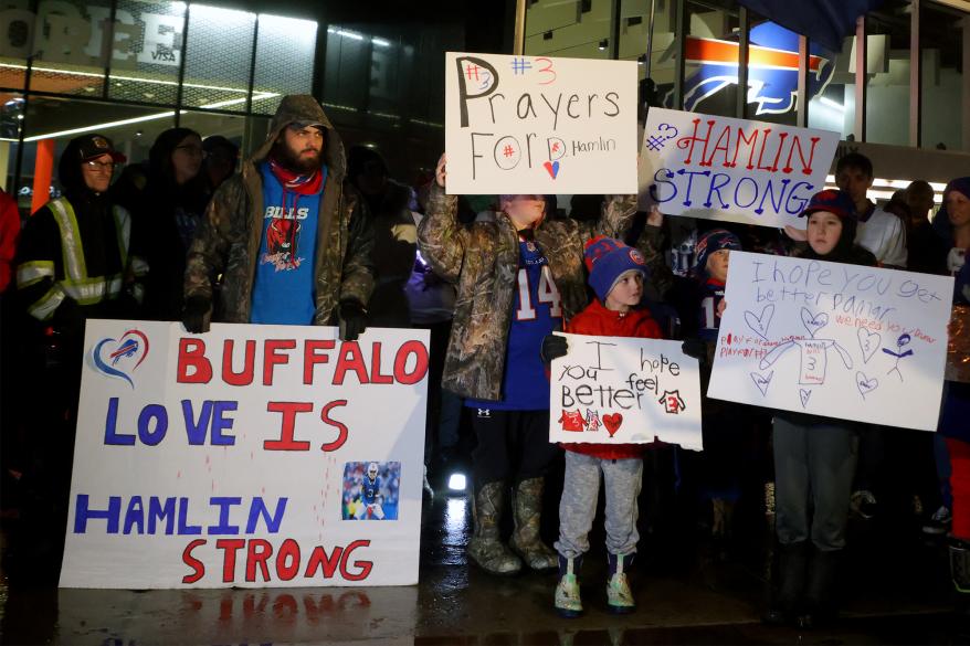 Bills fans attend a candlelight vigil for safety Damar Hamlin in Orchard Park, New York, on Jan. 3, 2023.