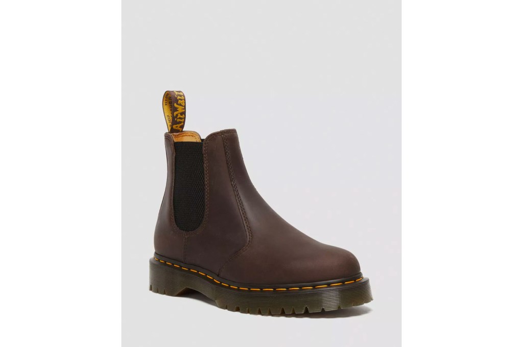 A pair of brown Chelsea boots.