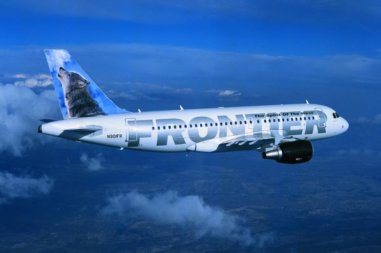 A Frontier Airlines jet in the sky