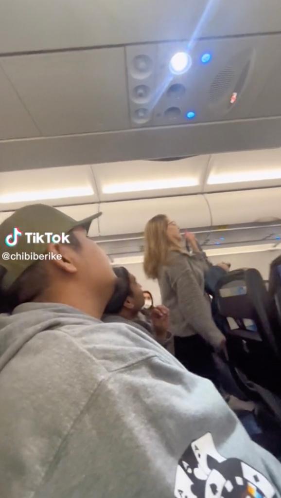 A woman being kicked off a Spirit Airlines flight Sunday in Las Vegas went viral after screaming that she hoped the flight would crash and everyone would die.