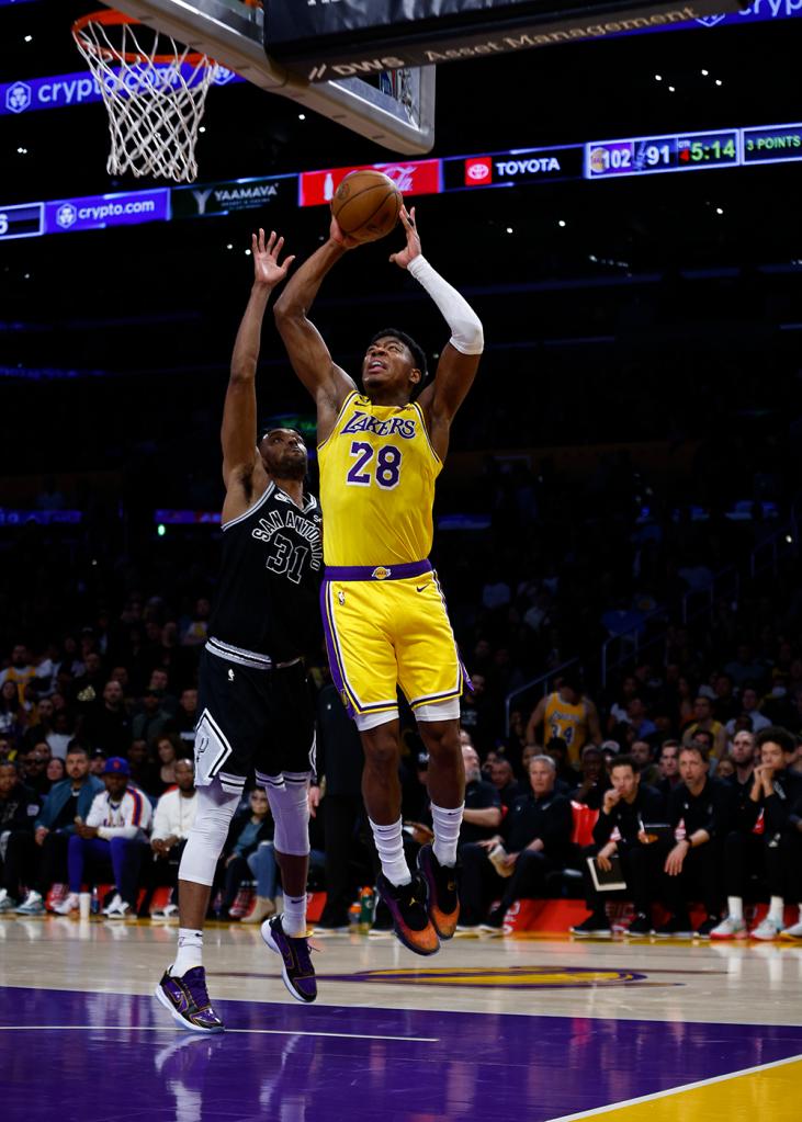 Lakers forward Rui Hachimura Spurs takes a shot against Spurs forward Keita Bates-Diop during a game at Crypto.com Arena on Jan. 25, 2023 in Los Angeles, California.