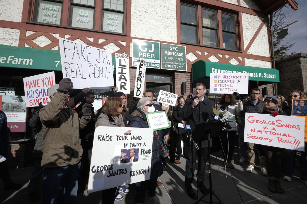 Protesters outside Rep. George Santos' Queens office.