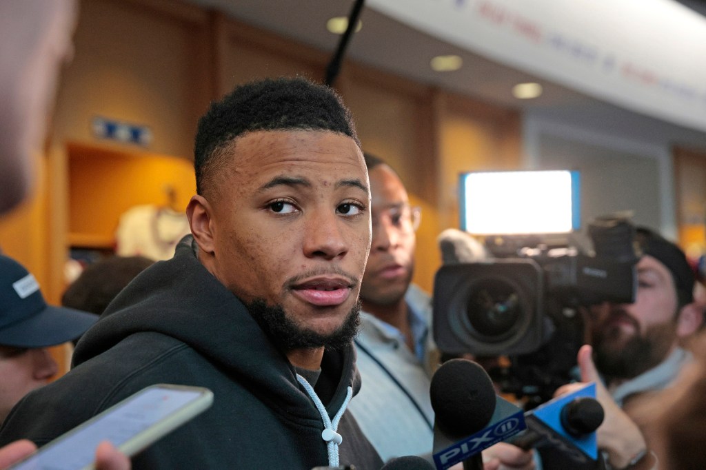 Giants running back Saquon Barkley speaks to reporters on Jan. 22, 2023.