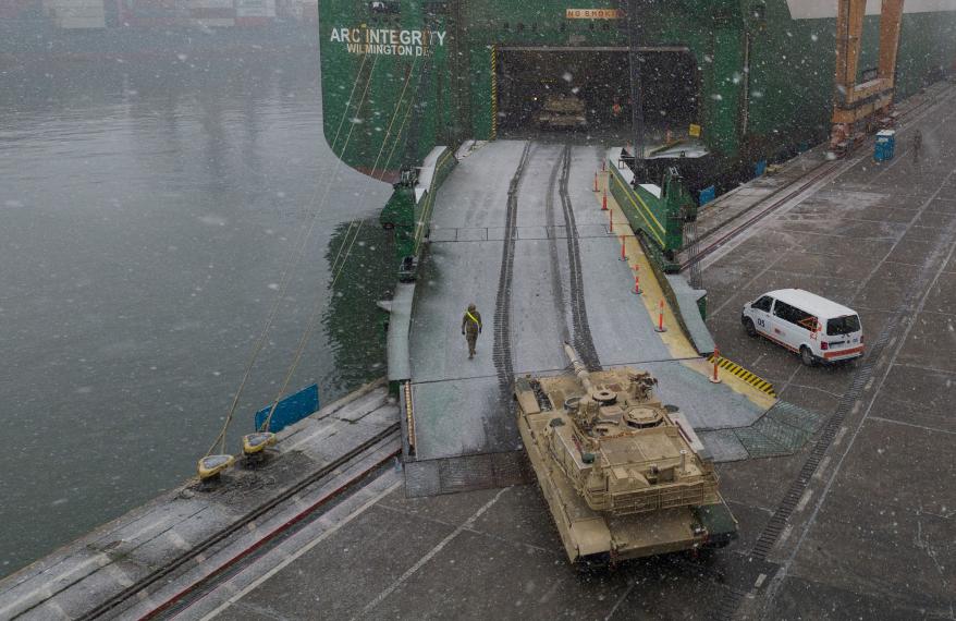A US Abrams tank getting unloaded after arriving in Poland. The announcement would reportedly come alongside a pledge from Poland and Germany to contribute their own tanks.