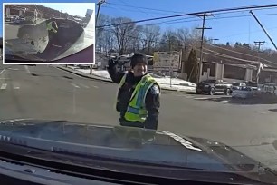 The Waterbury police officer shouted at the driver after she drove through an intersection he was directing.