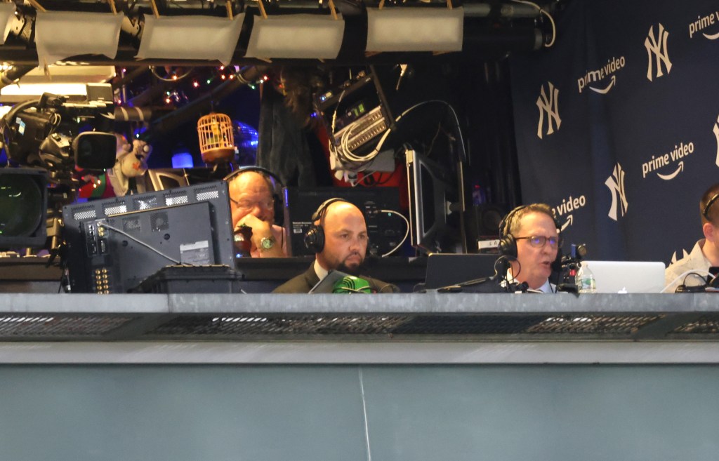 Carlos Beltran, left, in YES' booth last season. 