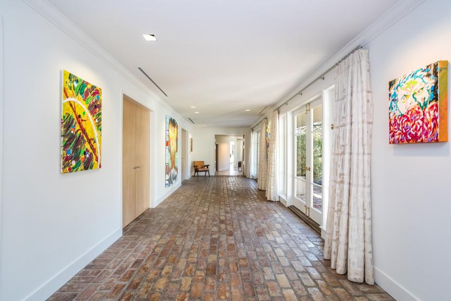 A hallway leading to the outdoors.