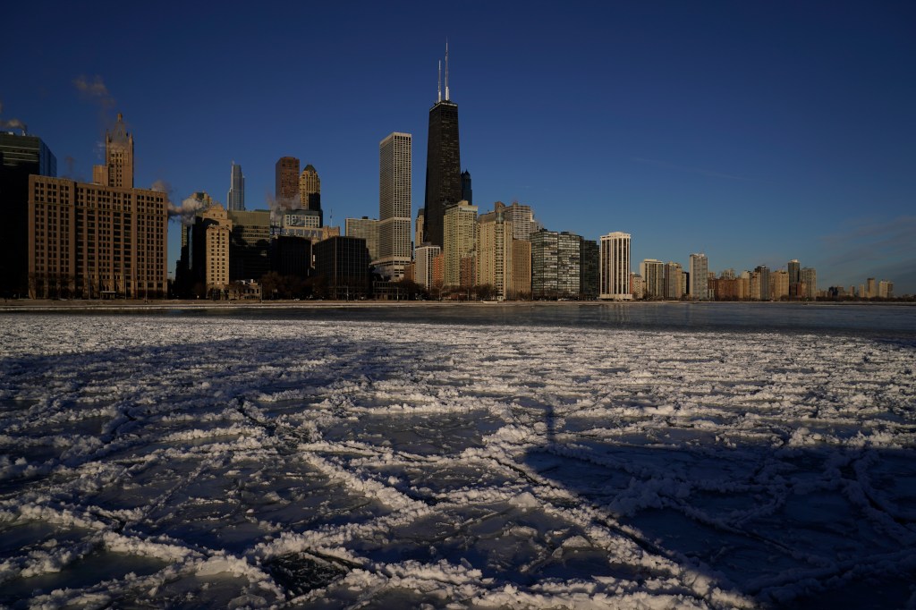 Ice piles up along Ohio Street Beach Friday, Feb. 3, as the severe weather poses a threat.
