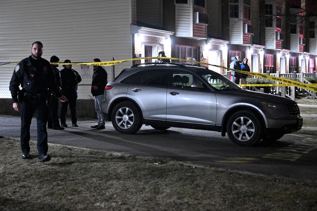 Officers respond to the scene of an off-duty cop shot at 472 Ruby Street.