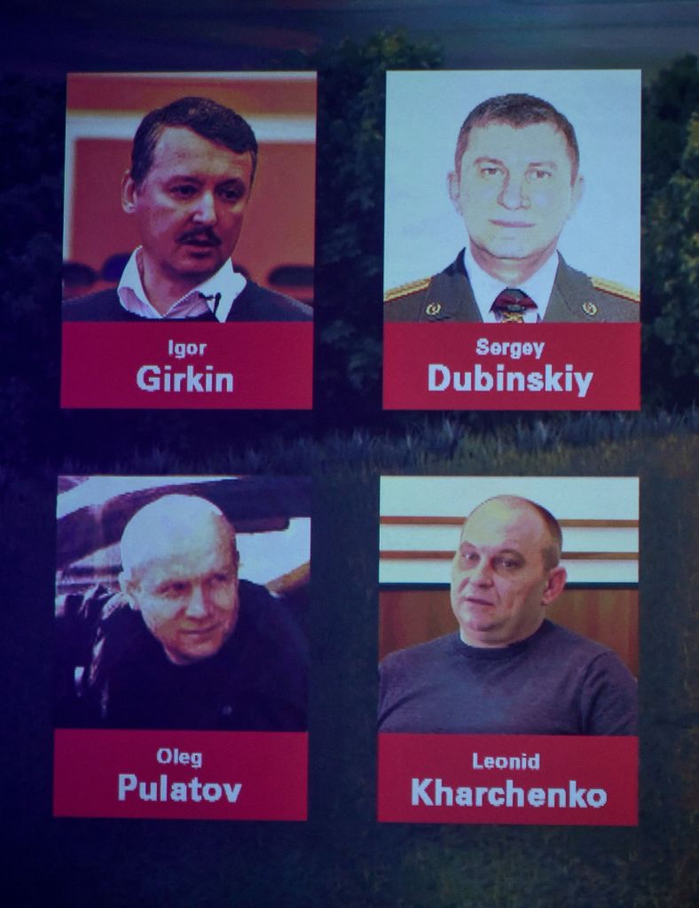 Pictures of  (from top to bottom), former FSB colonel Igor Girkin (Strelkov) Sergei Dubinsky employed by Russia's GRU military intelligence agency, Oleg Pulatov former soldier of the Spetznaz GRU and Ukrainian Leonid Kharchenko, are displayed on a screen on June 19, 2019 in Nieuwegein during a press conference of the Joint Investigation Team on the ongoing investigation of the Malaysia Airlines MH17 crash.