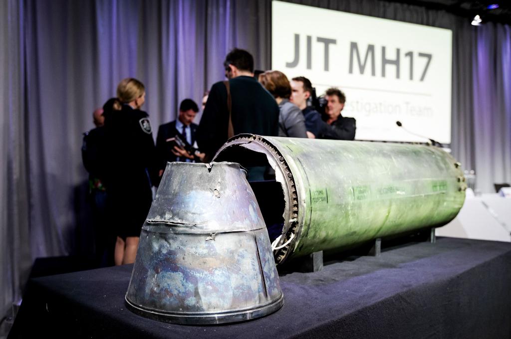 A part of the BUK-TELAR rocket that was fired on the MH17 flight is displayed on a table during the persconference of the Joint Investigation Team (JIT), in Bunnik on May 24, 2018.
