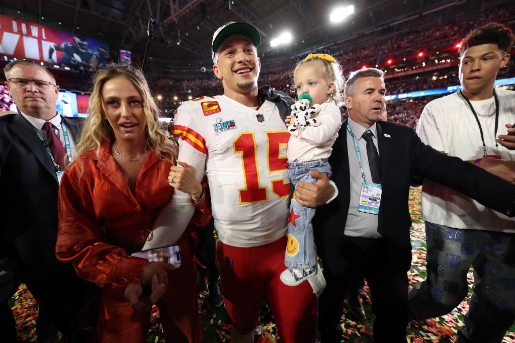 Patrick Mahomes #15 of the Kansas City Chiefs celebrates with his wife Brittany Mahomes and daughter Sterling Skye Mahomes after the Kansas City Chiefs beat the Philadelphia Eagles in Super Bowl LVII