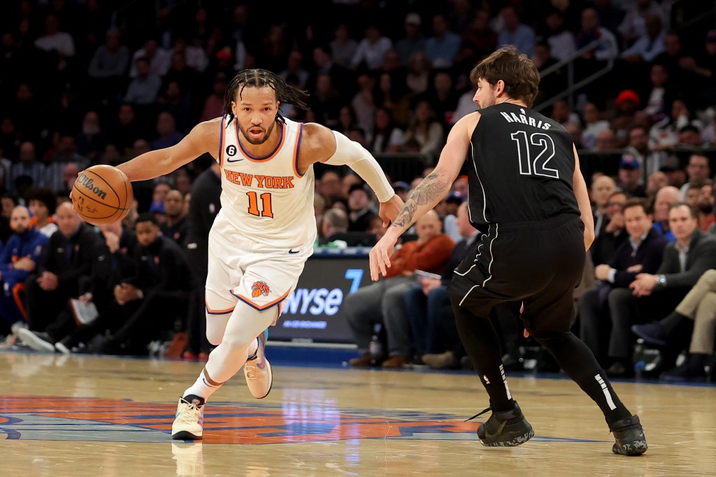 Knicks guard Jalen Brunson (11) dribbles during a game against the Nets on Feb. 13, 2023.