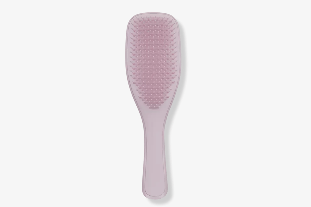 A pink hair brush