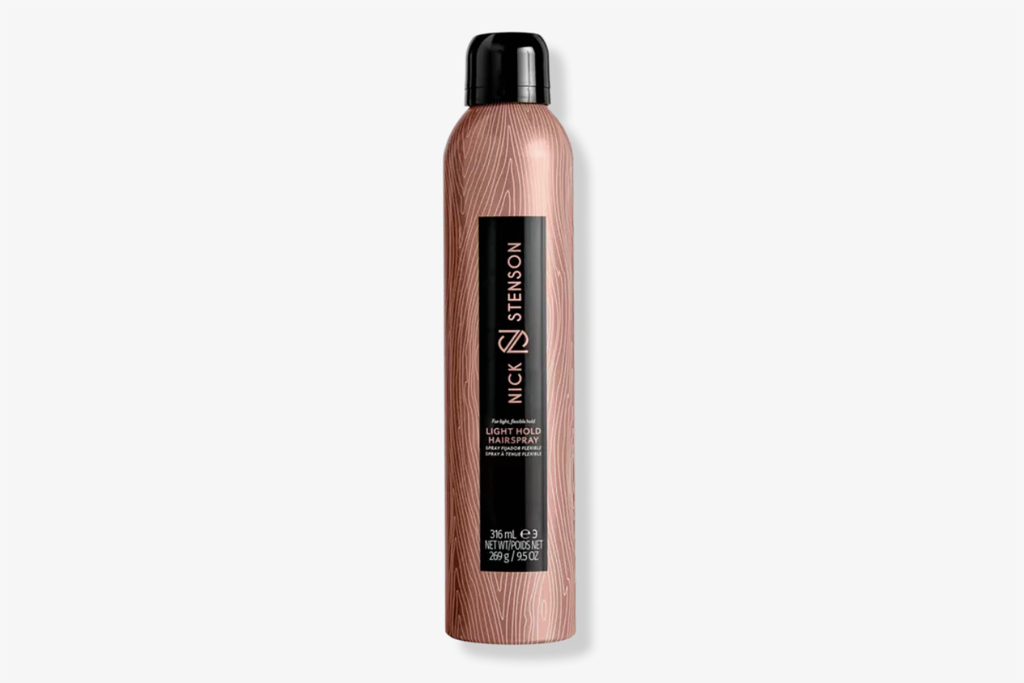 A pink hairspray bottle