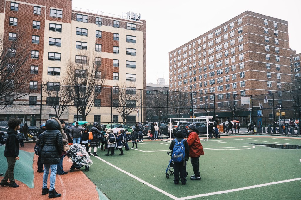 students on tennis court