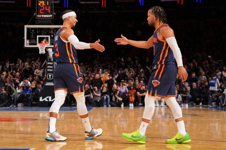 Josh Hart #3 and Jalen Brunson #11 of the New York Knicks high five during the game against the Utah Jazz on February 11, 2023 at Madison Square Garden in New York City, New York.