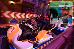 Guests ride Super Mario Kart during a preview of Super Nintendo World at Universal Studios in Los Angeles, Calif. on Jan. 13, 2023.