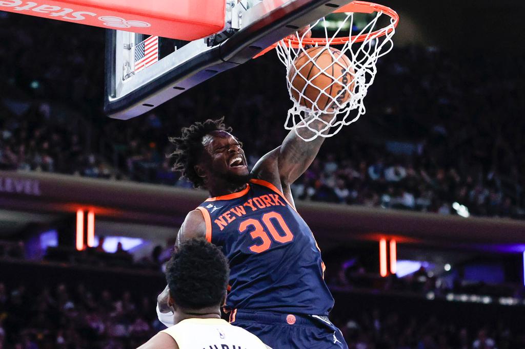 New York Knicks forward Julius Randle slams the ball against the Utah Jazz in the second half at Madison Square Garden in New York, USA, February 11, 2023.