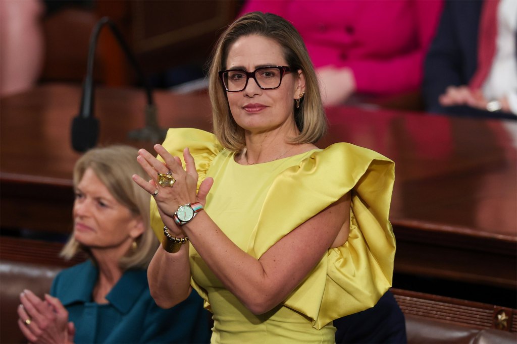 Sen. Kyrsten Sinema applauds during U.S. President Joe Biden's State of the Union address at the U.S. Capitol on Feb. 7, 2023 in Washington, DC.